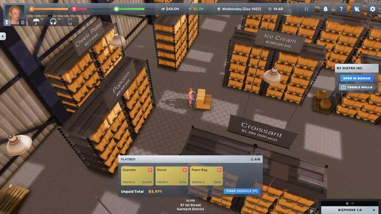 Warehouse interior with pallet racking and a delivery vehicle loading screen